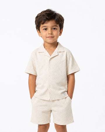 Boys boxy fit embossed resort co-ord set by Juniors.pk