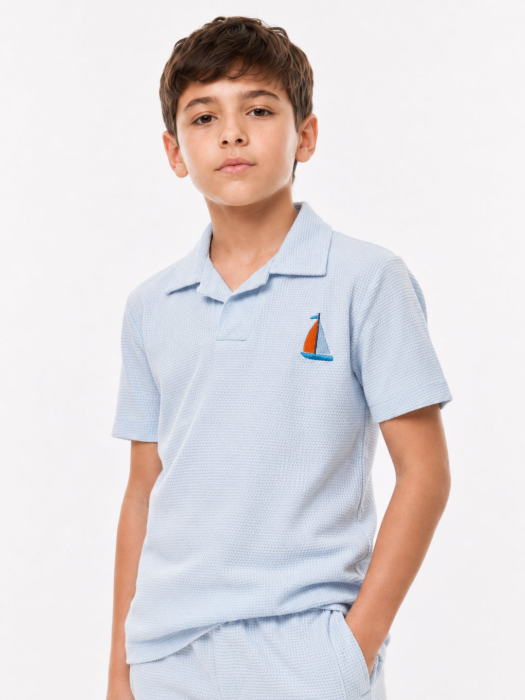 Boys embroidered waffle polo co-ord set by Juniors.pk