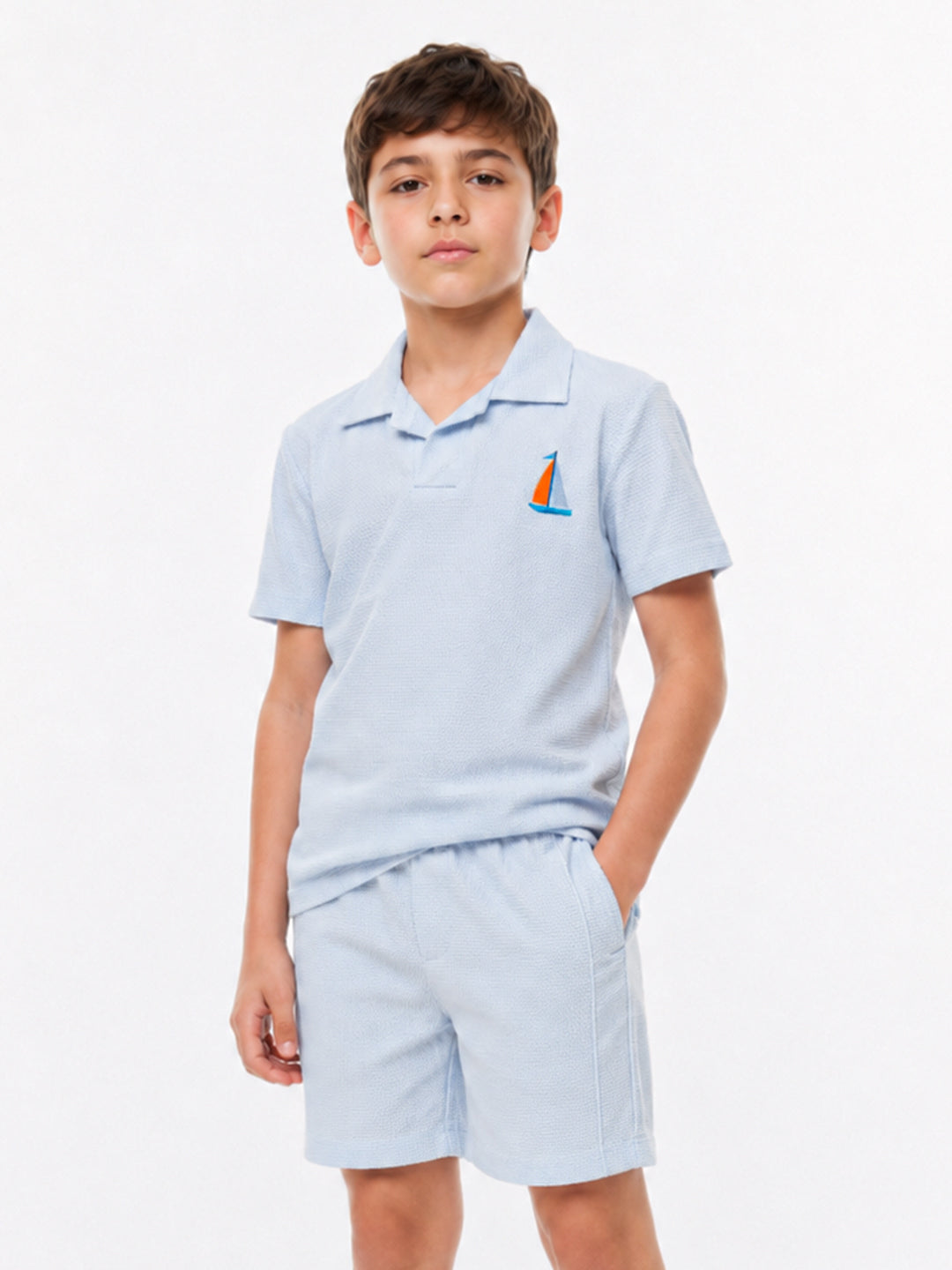 Boys embroidered waffle polo co-ord set by Juniors.pk