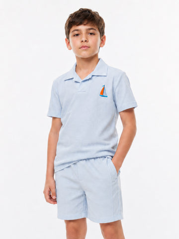Boys embroidered waffle polo co-ord set by Juniors.pk