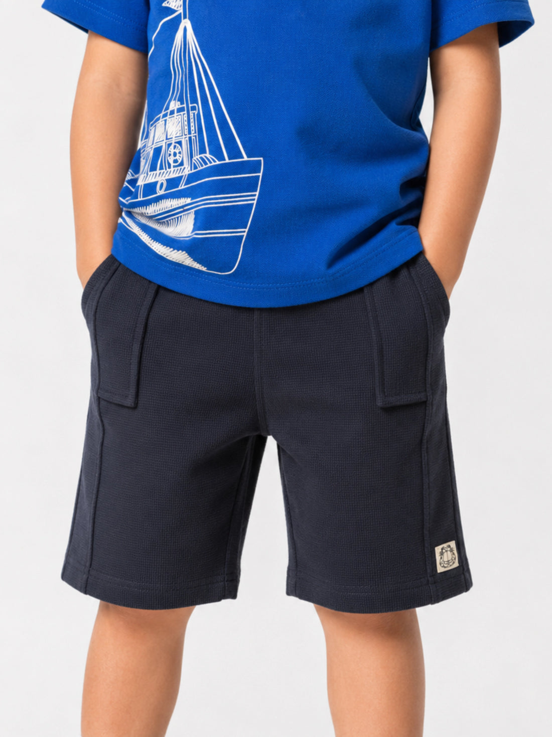 Boys textured waffle shorts by Juniors.pk