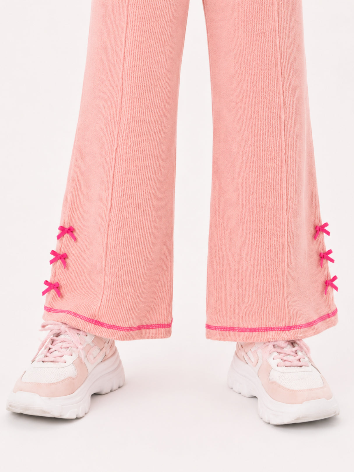 Girls bow-accented waffle co-ord set by Juniors.pk